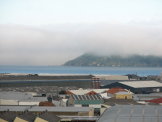 Somes Island almost hidden in the fog.