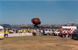 Explosions rock the airfield as the attack intensifies. (65Kb jpeg)