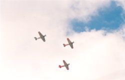 North American Harvard 2As doing formation aerobatic flying. (25Kb jpeg)
