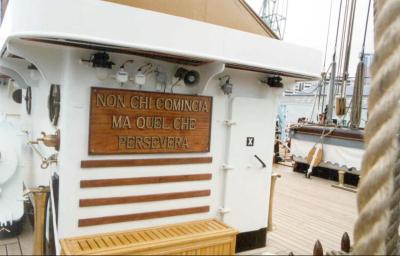 Motto of the ship loosely translated as 'The race goes not to the quick but those who perservere'.
