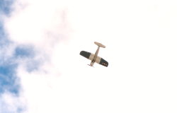 Corsair diving from the clouds. (18Kb jpeg)