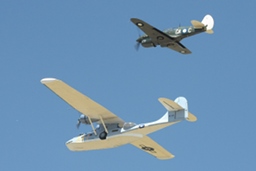 Catalina and a Kittyhawk share the sky. (196Kb jpeg)
